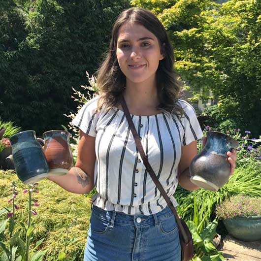 student-safron with her pots